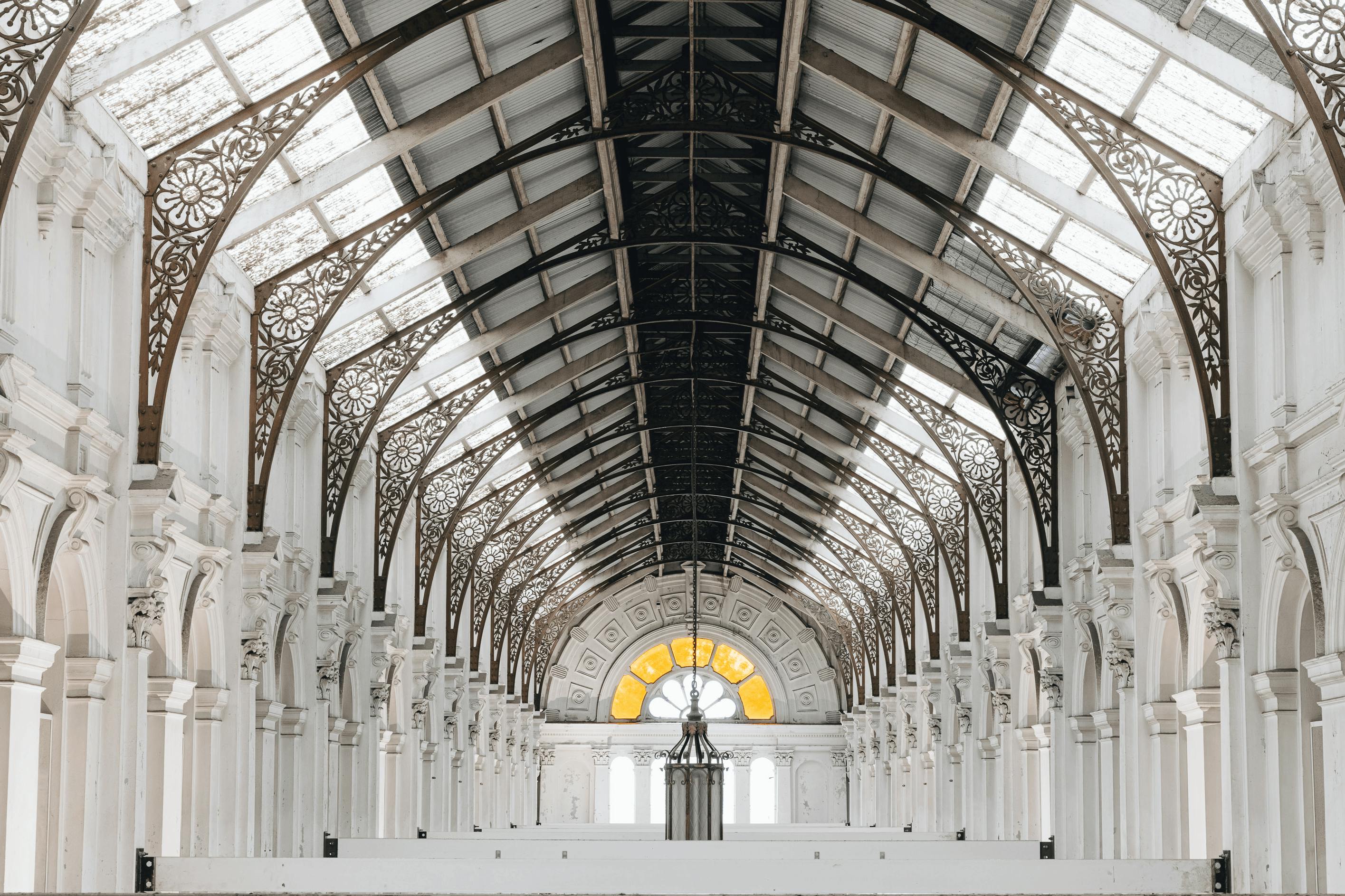 A big white hall with high ceilings.